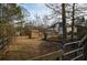 Backyard with wooden fence and gate; home in background at 5424 Central Church Rd, Douglasville, GA 30135