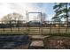 Backyard with fence, gate, and garden at 5424 Central Church Rd, Douglasville, GA 30135