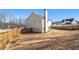 House backyard with a wooden fence and large yard at 61 Harmony Woods Ln, Dallas, GA 30157