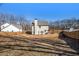 Large backyard with privacy fence and plenty of space for activities at 61 Harmony Woods Ln, Dallas, GA 30157