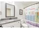 Unique bathroom with periodic table shower curtain and granite vanity at 61 Harmony Woods Ln, Dallas, GA 30157
