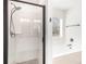 Clean bathroom with a large walk-in shower and neutral tile at 61 Harmony Woods Ln, Dallas, GA 30157