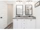 Elegant bathroom with double vanity, granite countertop, and large mirrors at 61 Harmony Woods Ln, Dallas, GA 30157