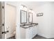 Modern bathroom with double vanity, granite countertop, and separate shower at 61 Harmony Woods Ln, Dallas, GA 30157