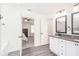 Spacious bathroom with double vanity and access to bedroom at 61 Harmony Woods Ln, Dallas, GA 30157