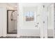 Bright bathroom featuring a soaking tub and a walk-in shower at 61 Harmony Woods Ln, Dallas, GA 30157