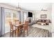 Casual dining area with table and chairs, adjacent to living room at 61 Harmony Woods Ln, Dallas, GA 30157