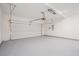Clean, spacious two-car garage with epoxy floor and automatic door opener at 61 Harmony Woods Ln, Dallas, GA 30157
