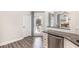 Kitchen with granite countertop, stainless steel dishwasher and backyard access at 61 Harmony Woods Ln, Dallas, GA 30157