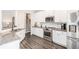 Modern kitchen with stainless steel appliances and granite countertops at 61 Harmony Woods Ln, Dallas, GA 30157