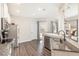 Modern kitchen with granite countertops and stainless steel appliances at 61 Harmony Woods Ln, Dallas, GA 30157