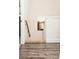 Upper hallway with simple wooden railing and mirror at 61 Harmony Woods Ln, Dallas, GA 30157