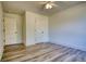 Spacious bedroom with wood-look floors and ample closet space at 3091 Old Mill Road, Rutledge, GA 30663