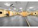 Aerobics room with mirrored wall and multiple exercise bikes and workout space at 401 16Th Nw St # 1376, Atlanta, GA 30363