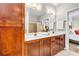 Spacious bathroom features double sinks, wood cabinets, and a walk-in shower at 401 16Th Nw St # 1376, Atlanta, GA 30363