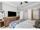 Cozy bedroom with bright, decorative bedding and a large woven-front cabinet at 401 16Th Nw St # 1376, Atlanta, GA 30363