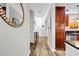 Inviting hallway with wood floors leads to the front door and kitchen at 401 16Th Nw St # 1376, Atlanta, GA 30363