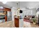 Inviting living space featuring a modern island kitchen open to the living room with a fireplace and balcony access at 401 16Th Nw St # 1376, Atlanta, GA 30363