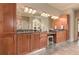 Beautiful bathroom with dual vanities and granite counters plus tile floors at 4478 Outpost Ct, Roswell, GA 30075