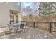 Wooden deck with outdoor table and chairs, providing great views of the yard and trees at 4478 Outpost Ct, Roswell, GA 30075
