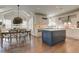 Spacious eat-in kitchen featuring an island, breakfast nook, and ample natural light at 4478 Outpost Ct, Roswell, GA 30075