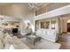 Elegant living room with high ceilings and seamlessly connected to the kitchen area at 4478 Outpost Ct, Roswell, GA 30075
