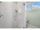 Shower with white subway tiles and glass enclosure at 927 Amsterdam Ne Ave, Atlanta, GA 30306