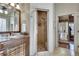 Beautiful bathroom featuring a glass shower enclosure, tile floors, and modern fixtures at 305 Glengarry Chase, Covington, GA 30014
