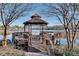 Community gazebo overlooking the serene lake, perfect for relaxation and outdoor enjoyment at 305 Glengarry Chase, Covington, GA 30014