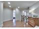 Upstairs hallway featuring hardwood floors, updated trim, and lots of natural light at 305 Glengarry Chase, Covington, GA 30014