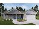 Gray two-story house with white accents, two-car garage, and landscaped yard at 8970 Callaway Dr, Winston, GA 30187
