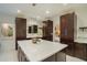 Well-lit bathroom with island, modern fixtures, cabinets and adjacent bedroom at 201 Windflower Ct, Canton, GA 30115