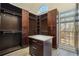 Walk-in closet with built-in shelving, storage, and natural light from a window at 201 Windflower Ct, Canton, GA 30115