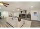 Open concept Gathering room with stone fireplace and luxury vinyl plank flooring at 201 Windflower Ct, Canton, GA 30115