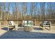 Relaxing outdoor deck featuring comfortable seating and a stylish rug at 201 Windflower Ct, Canton, GA 30115