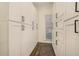 Pantry with ample storage space, custom cabinets, and hardwood floors at 201 Windflower Ct, Canton, GA 30115