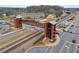 Aerial view of neighborhood and pedestrian bridge over railroad tracks at 4213 Legacy Ln # 32, Acworth, GA 30101