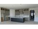 Spacious kitchen with a large center island, white cabinets, and stainless steel appliances at 4213 Legacy Ln # 32, Acworth, GA 30101