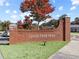 Logan Farm Park brick entrance sign with neatly trimmed grass and a clear view of surrounding trees at 4213 Legacy Ln # 32, Acworth, GA 30101