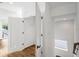 Bright hallway with hardwood floors and access to a closet at 520 Wabash Ne Ave # B, Atlanta, GA 30312