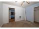 Simple bedroom with ceiling fan and closet at 388 Highway 20 Spur, Cartersville, GA 30121