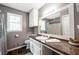 Bathroom with granite countertop and white cabinets at 4297 Earney Rd, Woodstock, GA 30188
