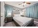 Bright bedroom featuring a full-size bed and ample closet space at 4297 Earney Rd, Woodstock, GA 30188