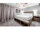 Spacious bedroom with king-size bed and modern nightstands at 4297 Earney Rd, Woodstock, GA 30188