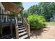 Steps leading up to a spacious deck with pergola at 4297 Earney Rd, Woodstock, GA 30188
