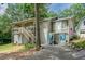 Charming multi-level home with covered parking and an American flag displayed at 4297 Earney Rd, Woodstock, GA 30188