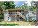 Two-story house with a deck and spacious yard at 4297 Earney Rd, Woodstock, GA 30188
