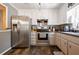 Well-equipped kitchen with stainless steel appliances and white cabinets at 4297 Earney Rd, Woodstock, GA 30188