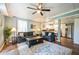 Spacious living room is adjacent to the kitchen and features a comfortable sitting area at 4297 Earney Rd, Woodstock, GA 30188