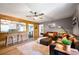 Relaxing living area with leather sectional and open kitchen view at 4297 Earney Rd, Woodstock, GA 30188